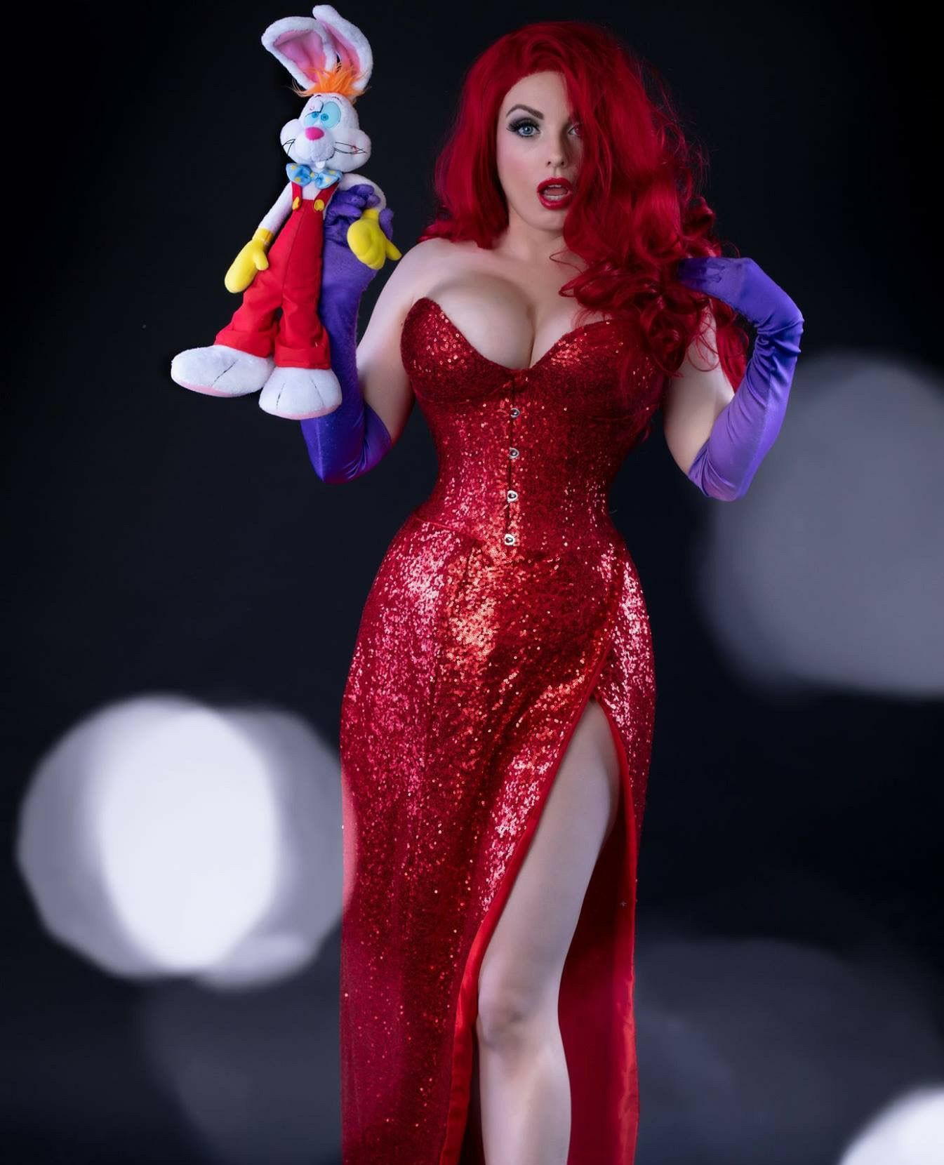 Jessica Rabbit costume act holding roger rabbit toy character
