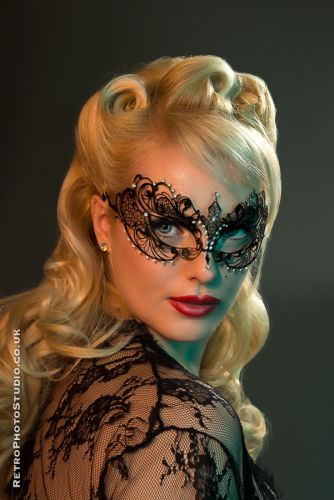blond fashion model black lace top and matching mask